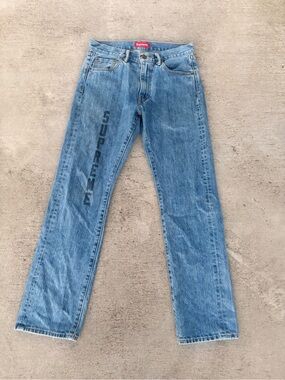 Supreme Light Blue Straight-Leg Jeans with Vertical Logo